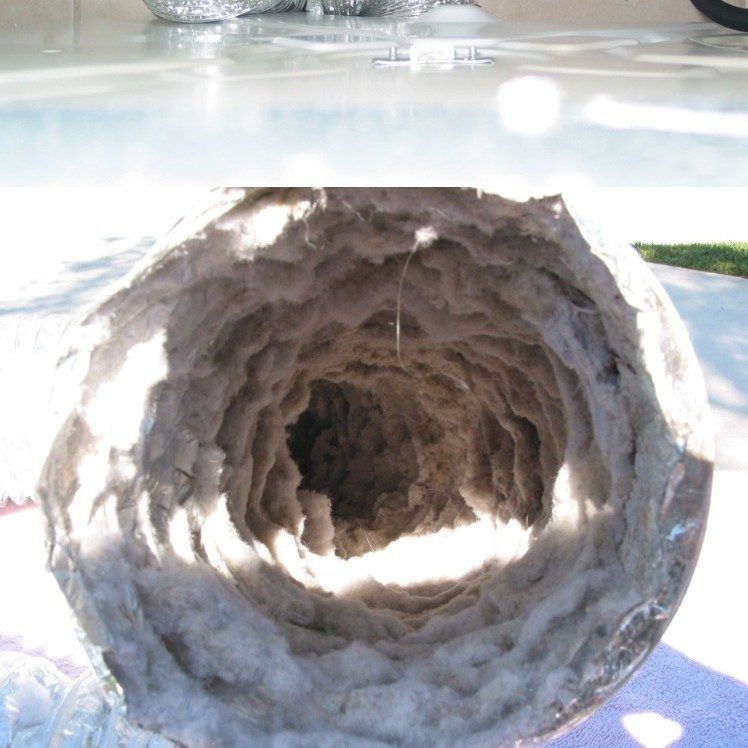 Dryer vent hose packed with lint