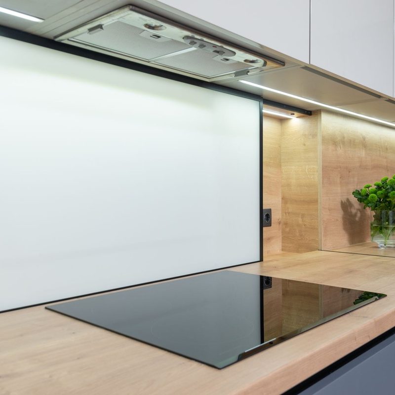 Range hood above a kitchen cooktop